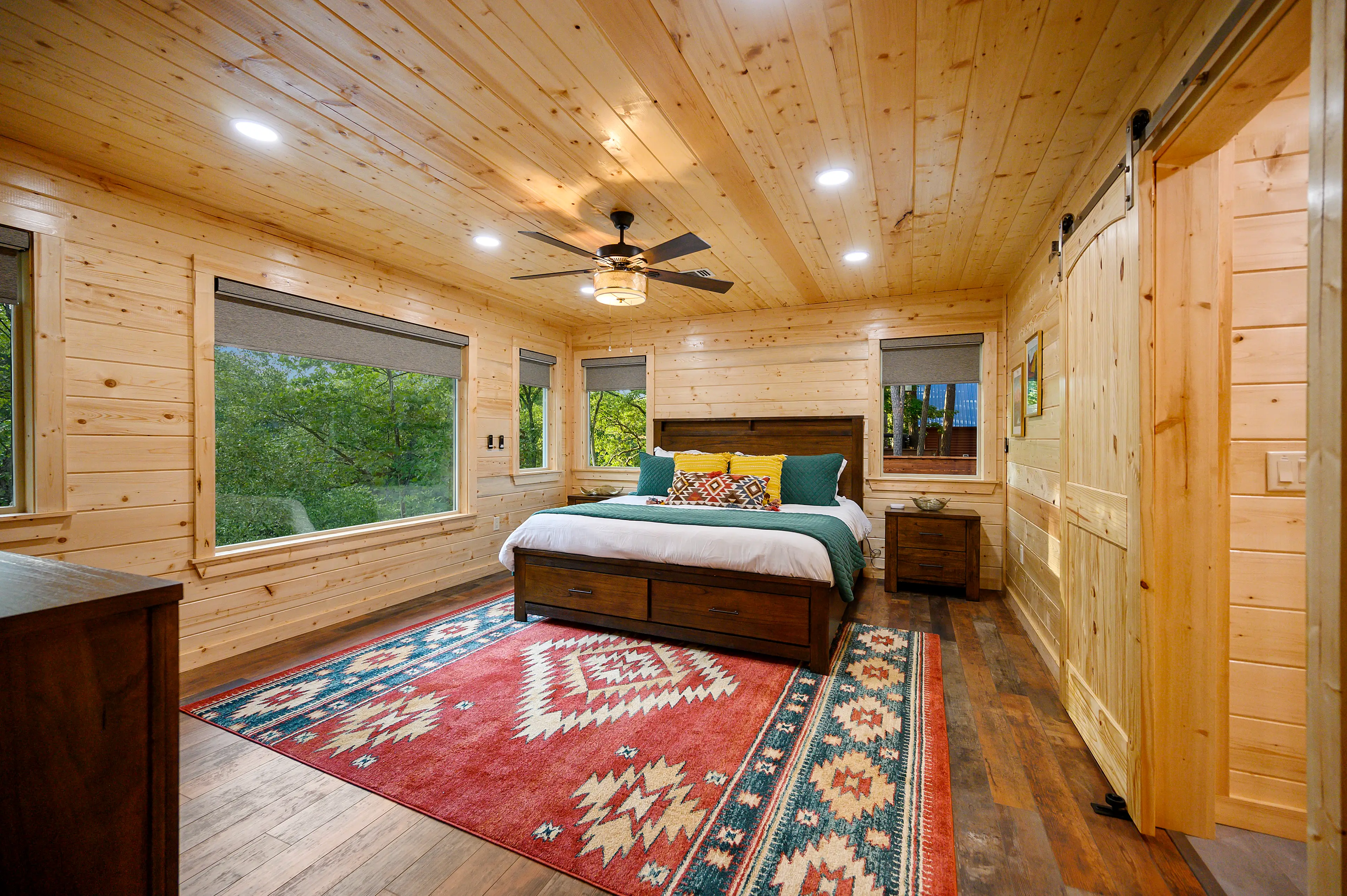 The master king bedroom has picture windows overlooking the Mountain Fork River!