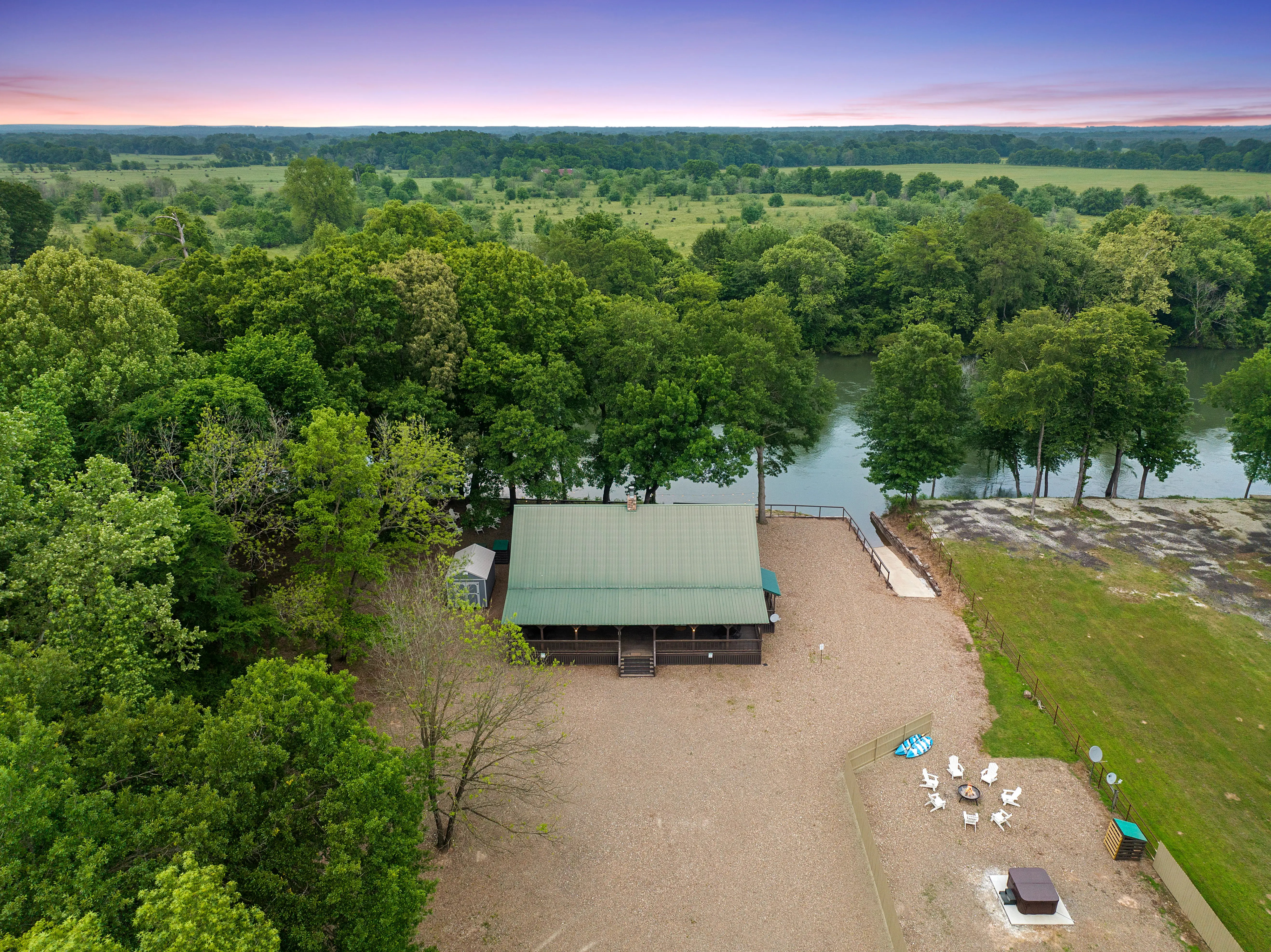 Riverhawk is the larger cabin sitting closer to the river.