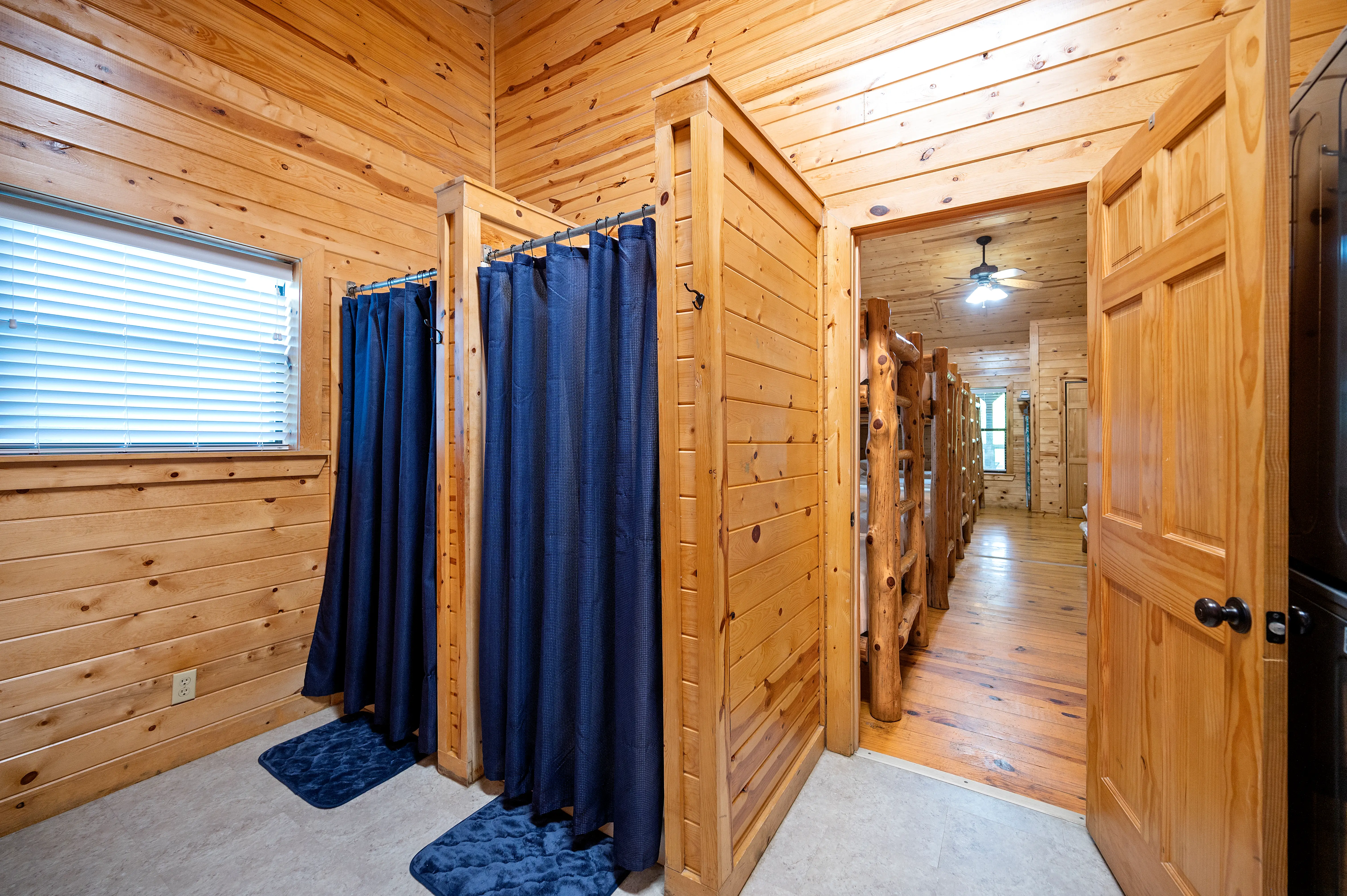 Each bath opens to its bunkroom.