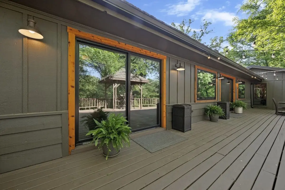 Sliding patio doors in the both the living room and master opening to the huge back porch!
