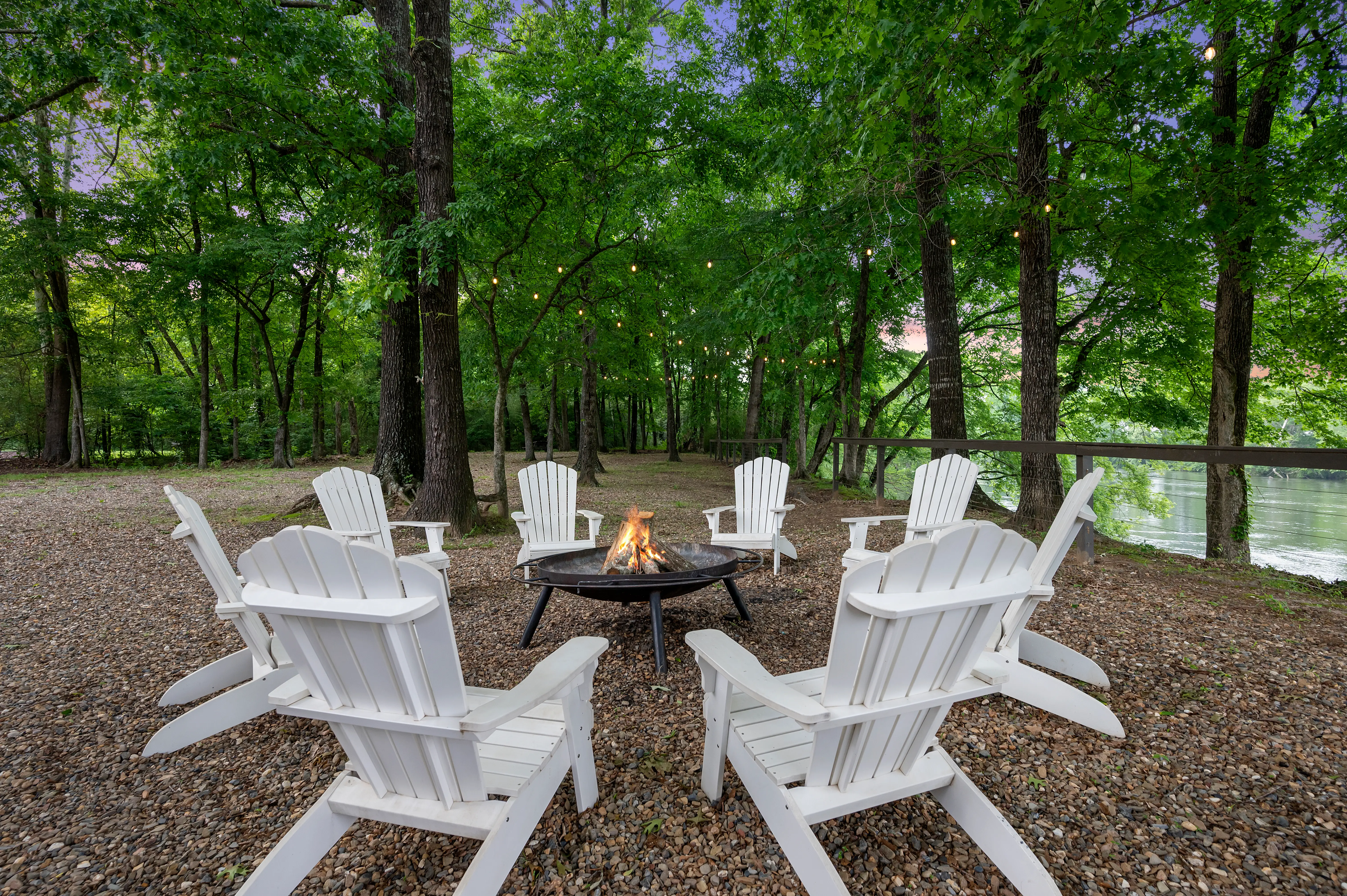 Huge yard for the kids to play while adults enjoy the fire pit and view!