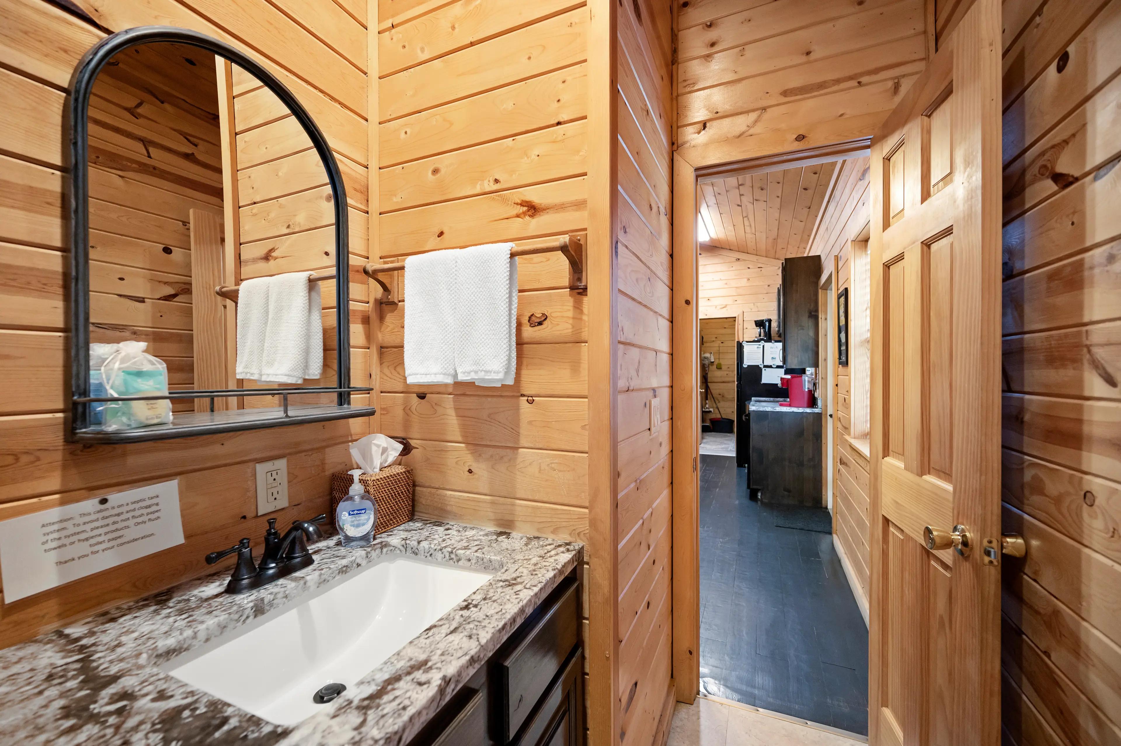 The second bath is located off the kitchen/dining area.