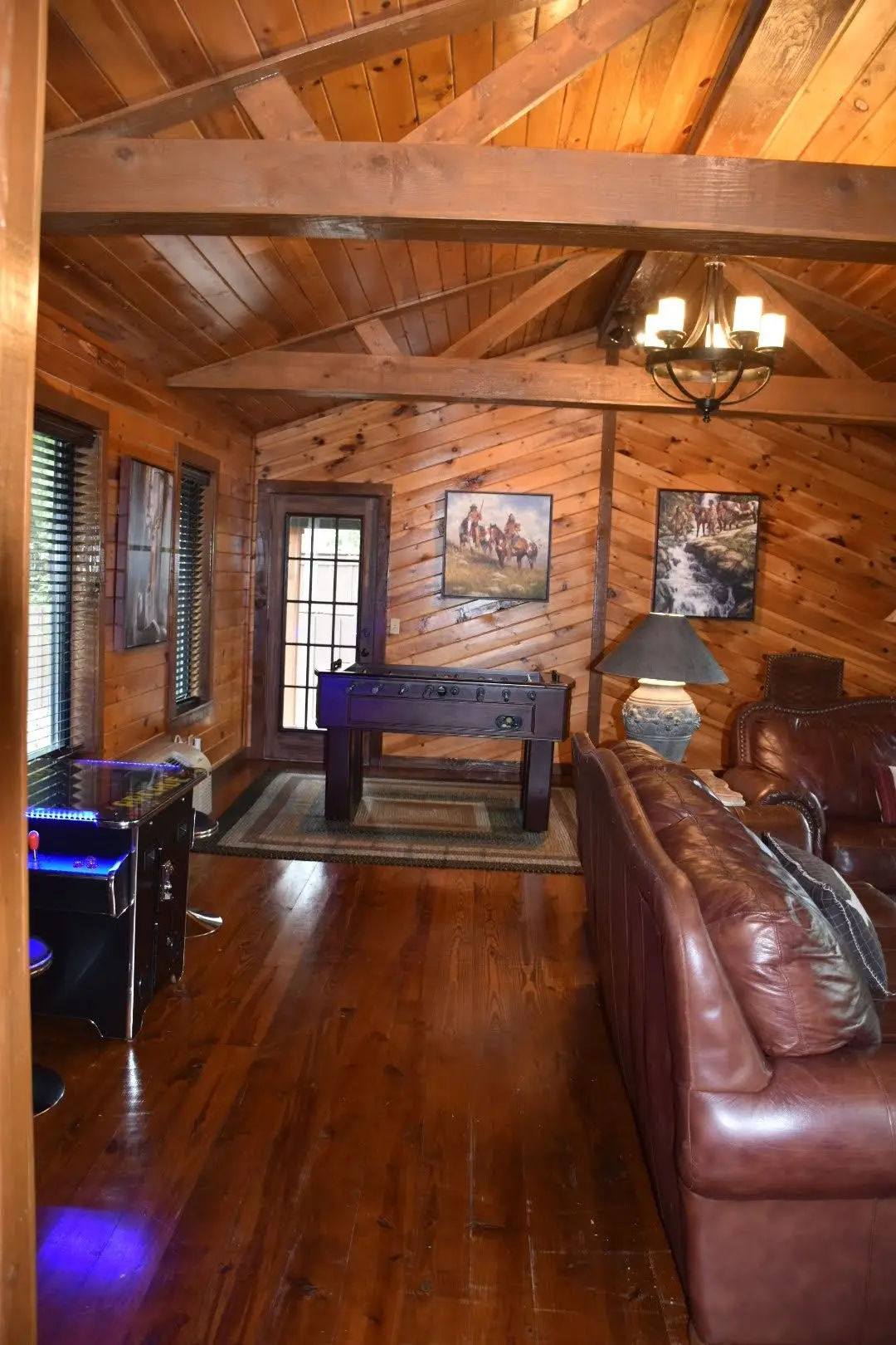 The den with a backdoor leading to the outdoor games