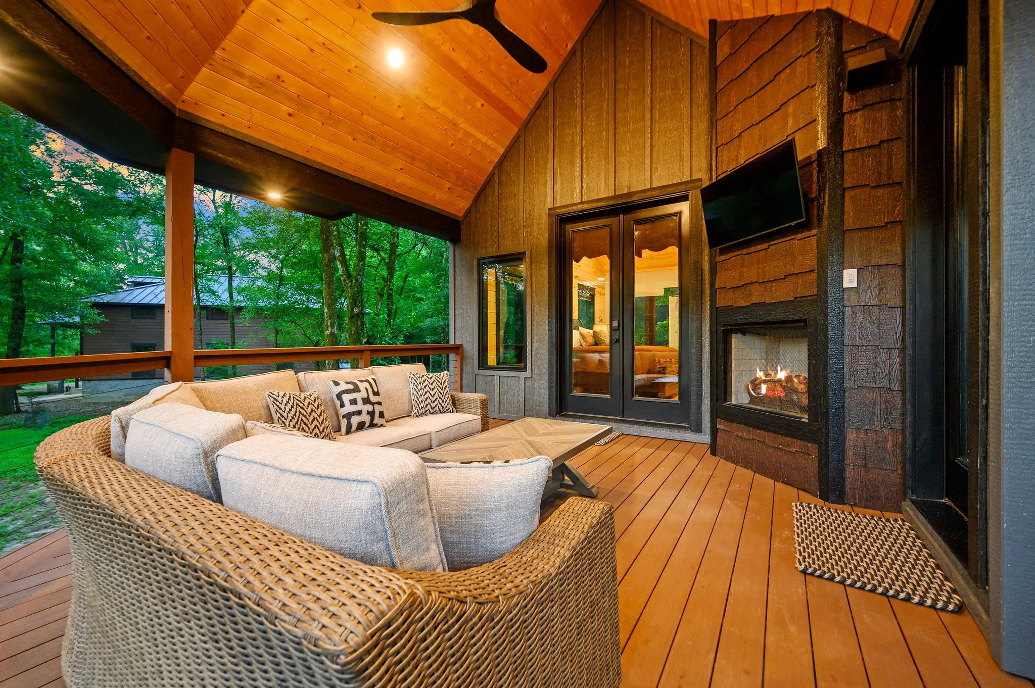 Fireplace and TV through the master's double doors