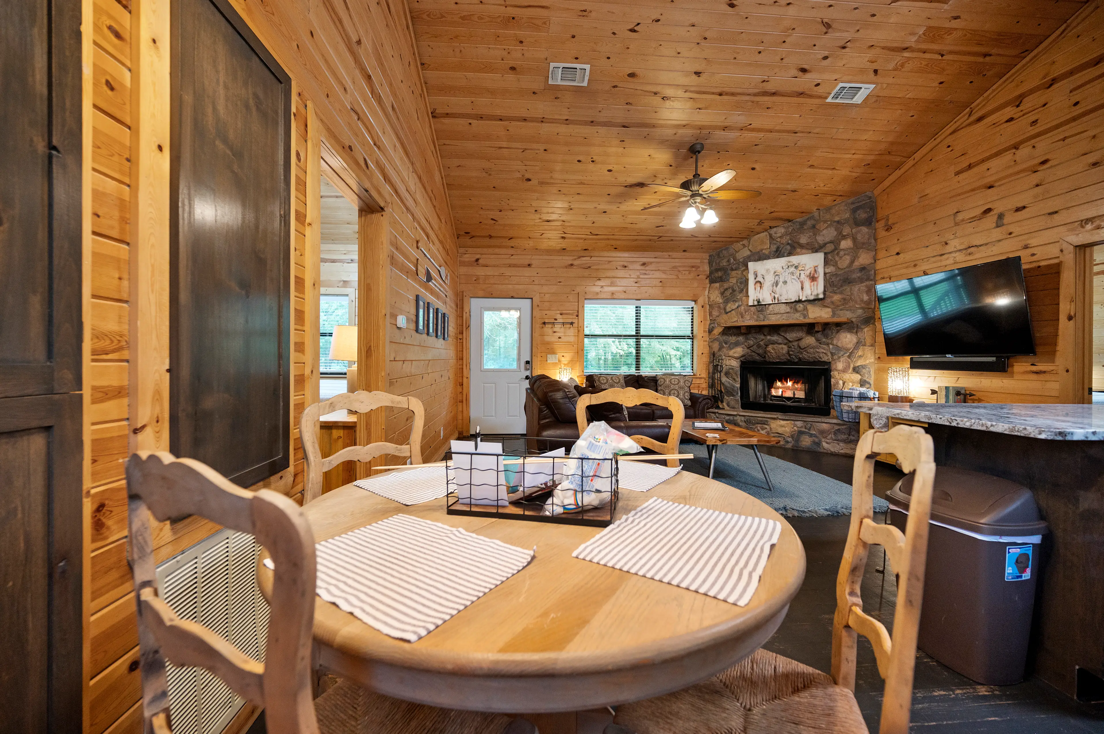 Open floor plan of the dining, living, and kitchen areas.