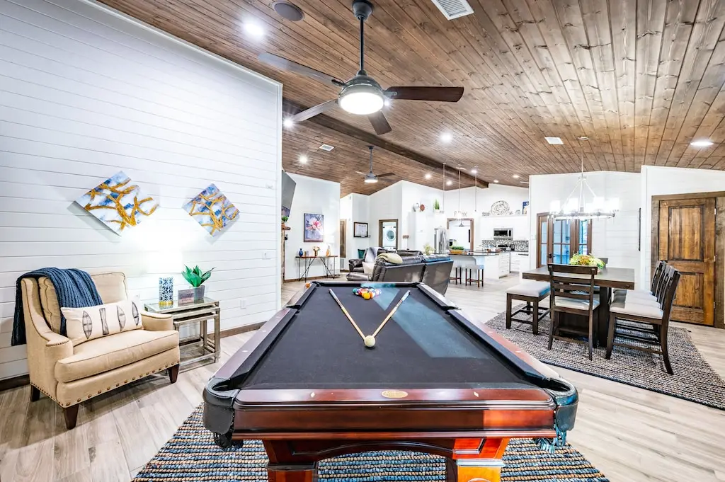 Pool table just off the living room/dining area.