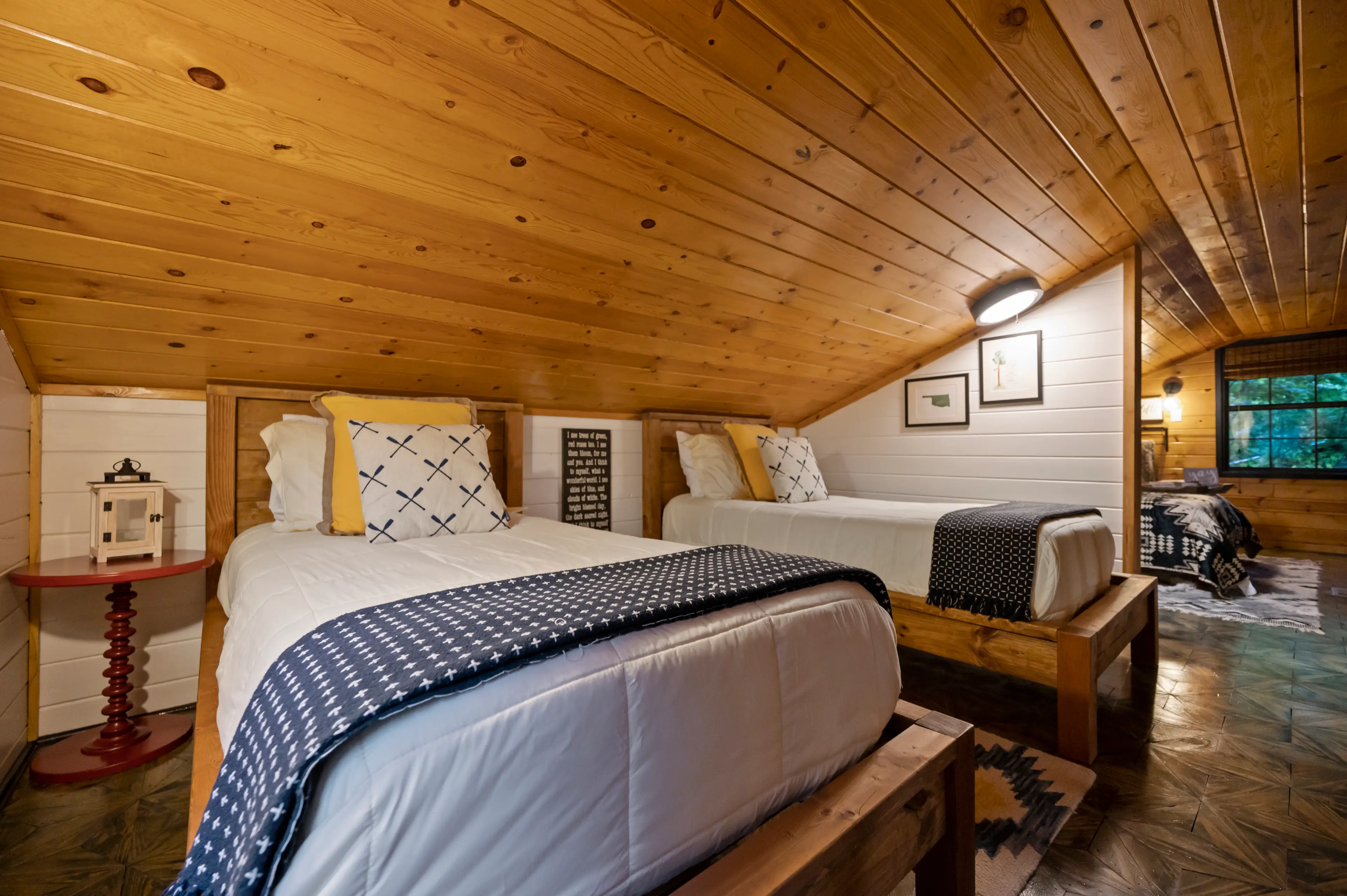 The bedrooms are open to each other, separated by a wall.