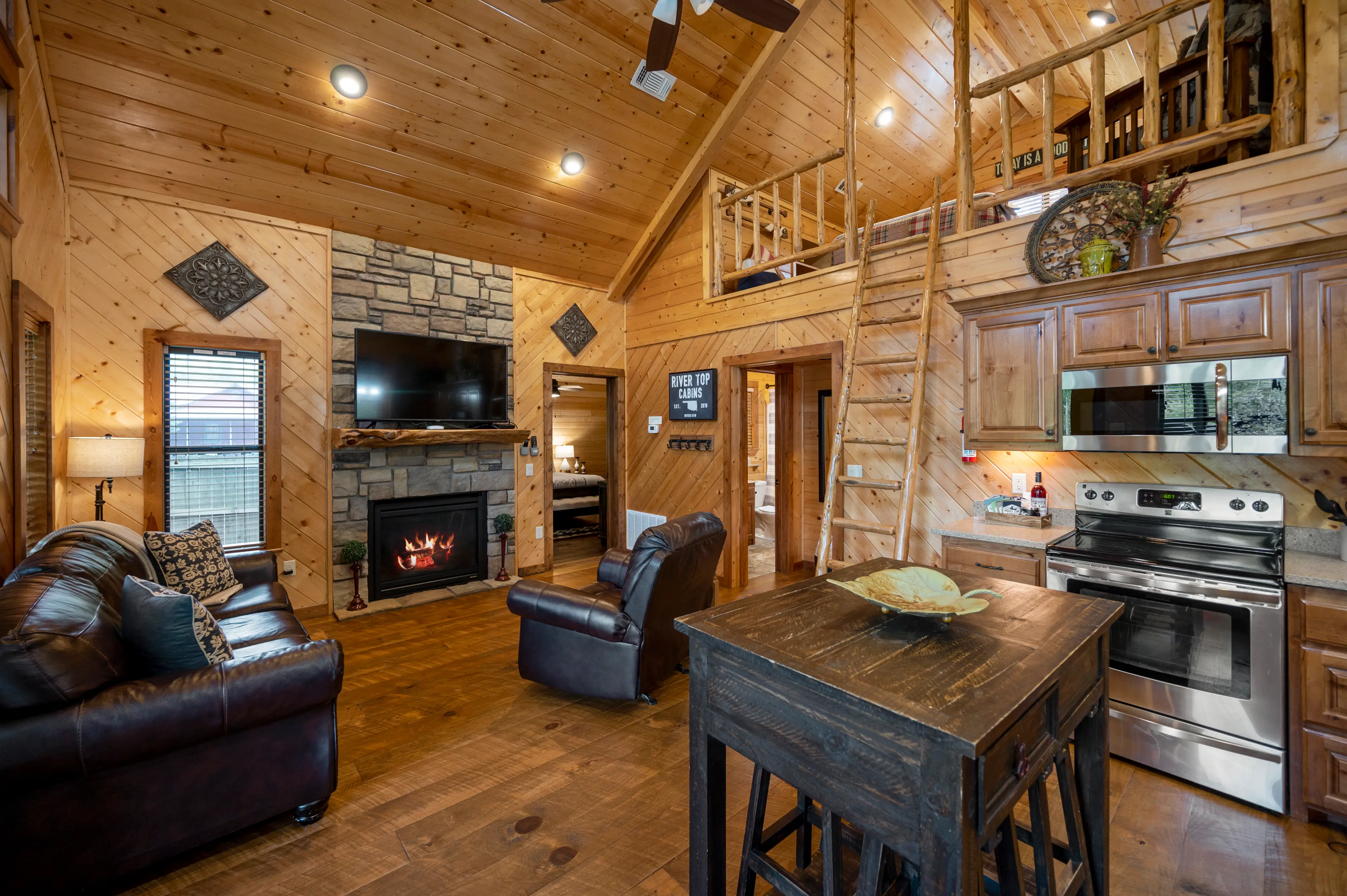 The large smart TV located over the seasonal gas fireplace!