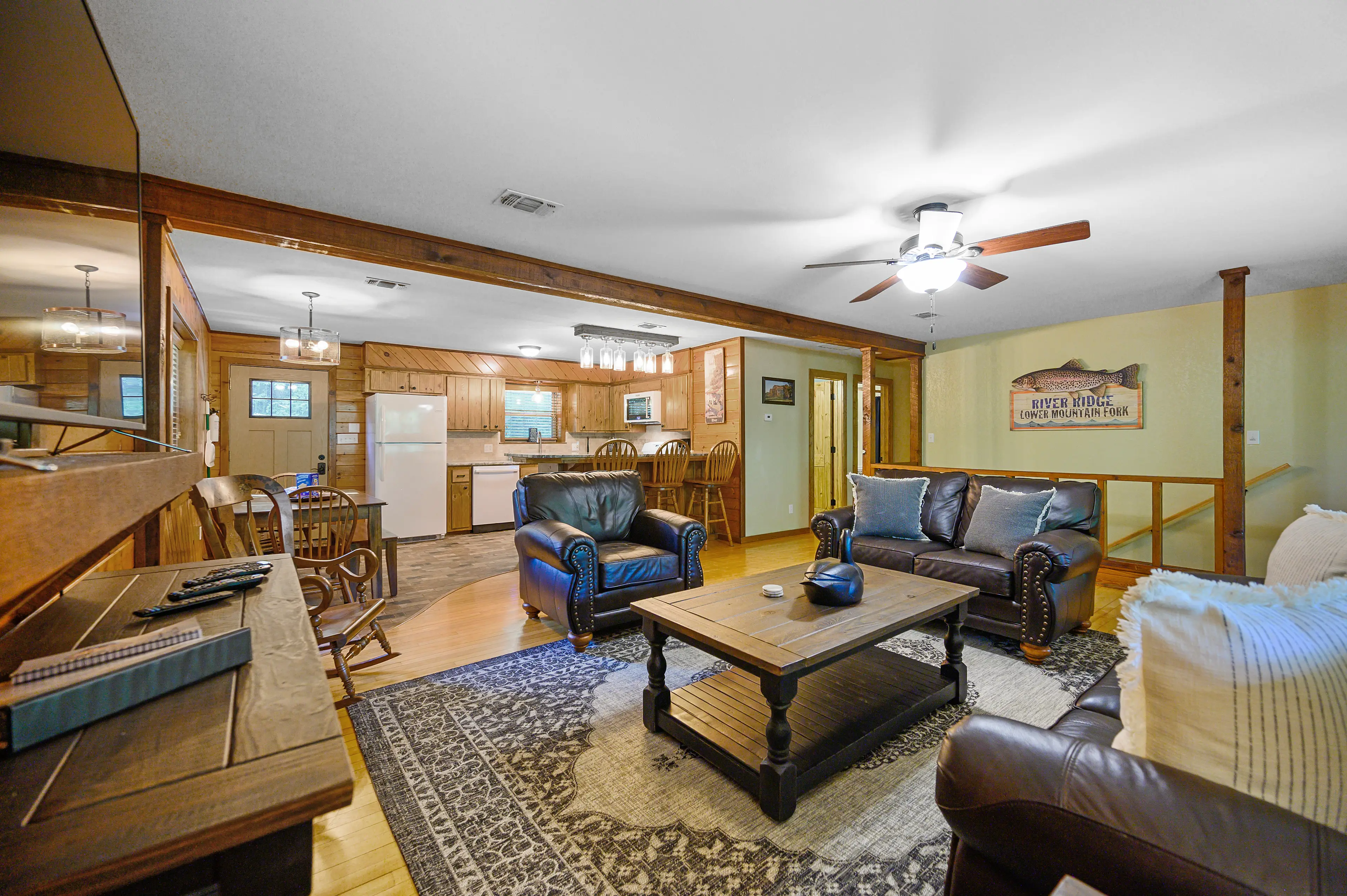 The living room opens to the kitchen and bar area.