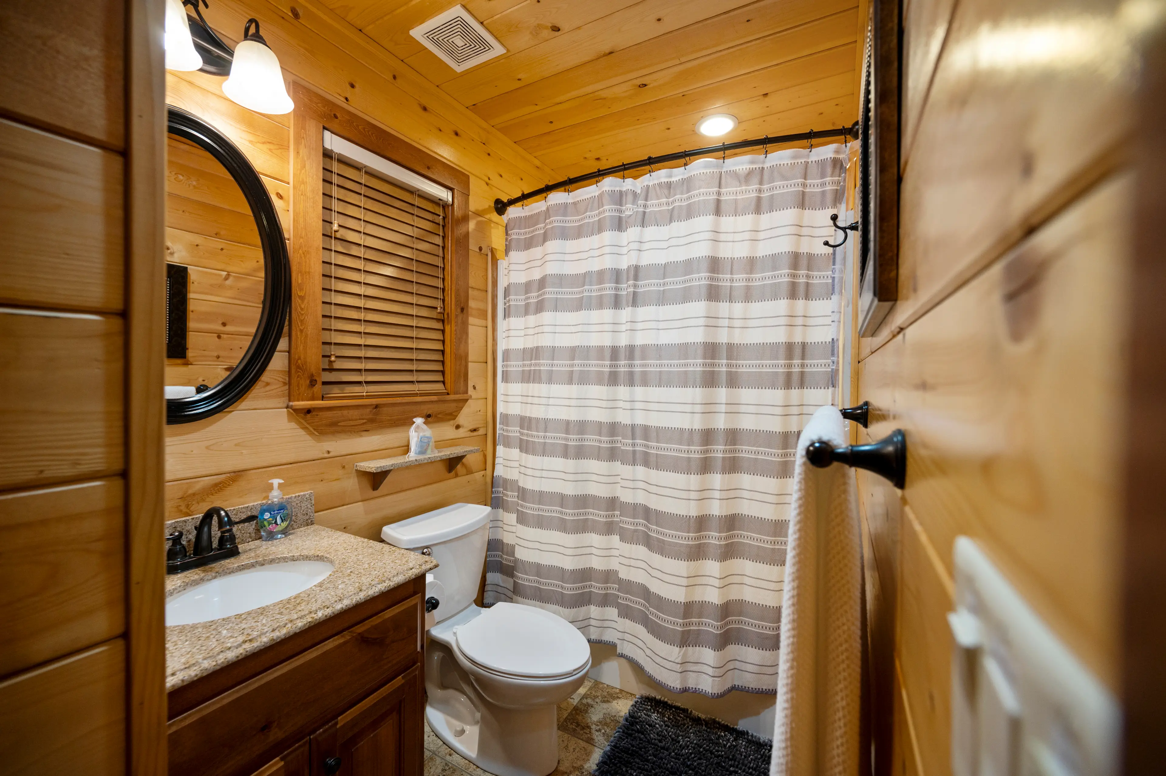 The hall bath just off bedroom two with a tub/shower combo.