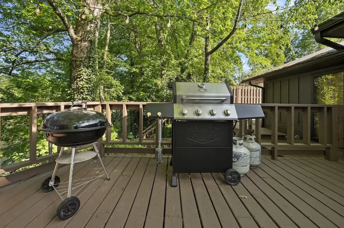 Both propane and charcoal grills on the back deck/porch