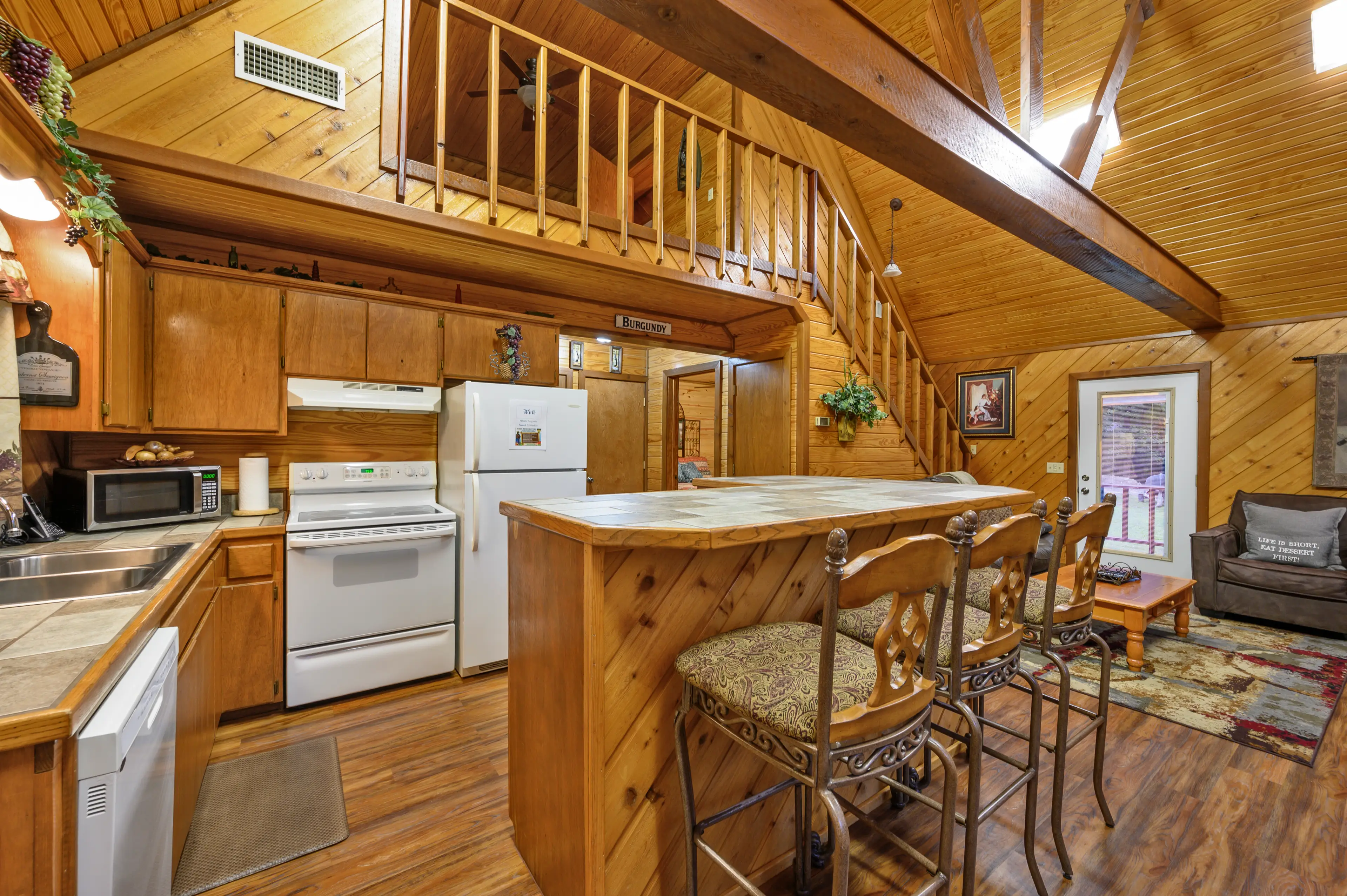 When you enter Burgundy, you'll walk into the open concept dining/kitchen/living areas.