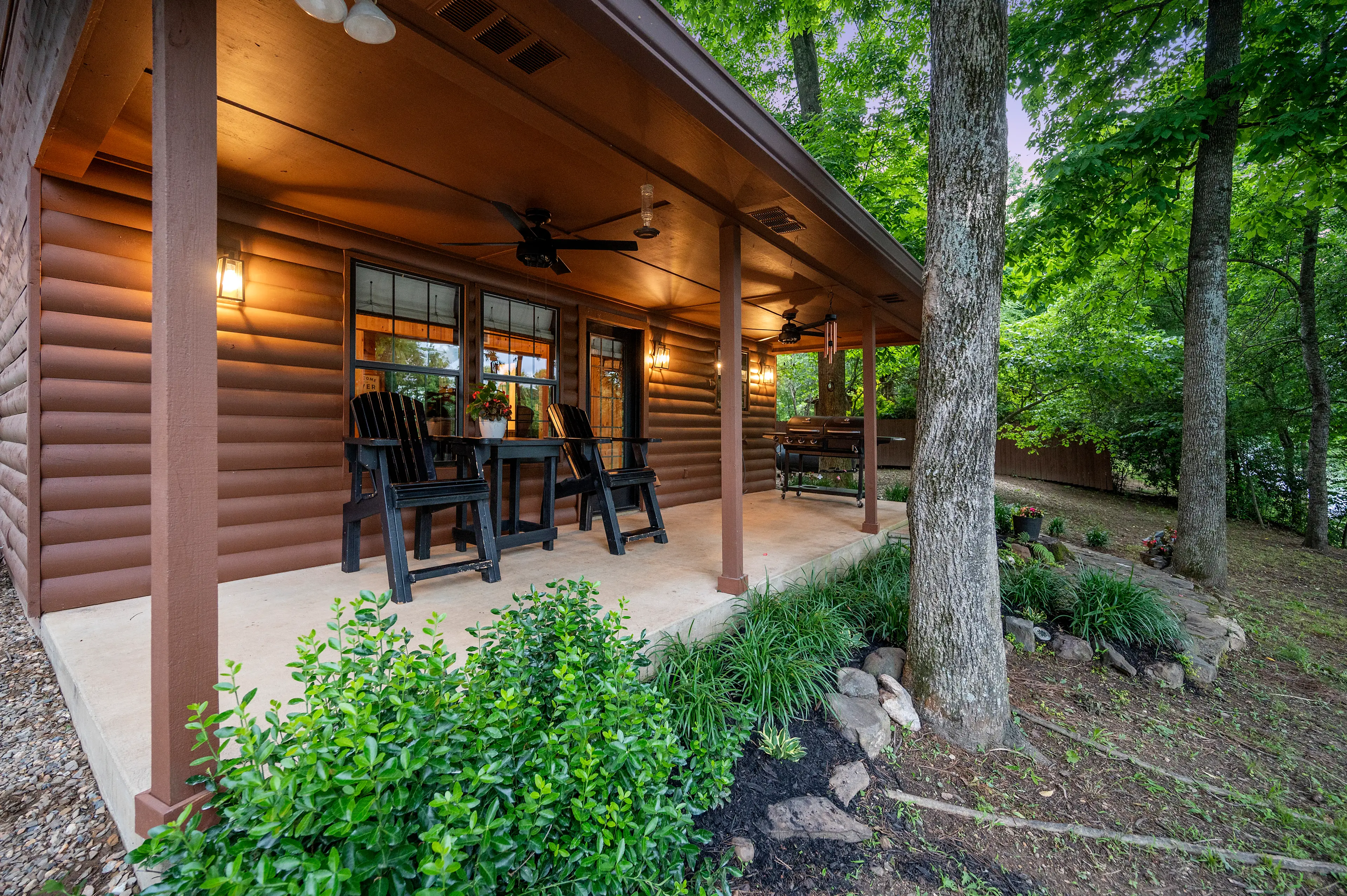 The back porch with a combo grill with both propane and charcoal options.