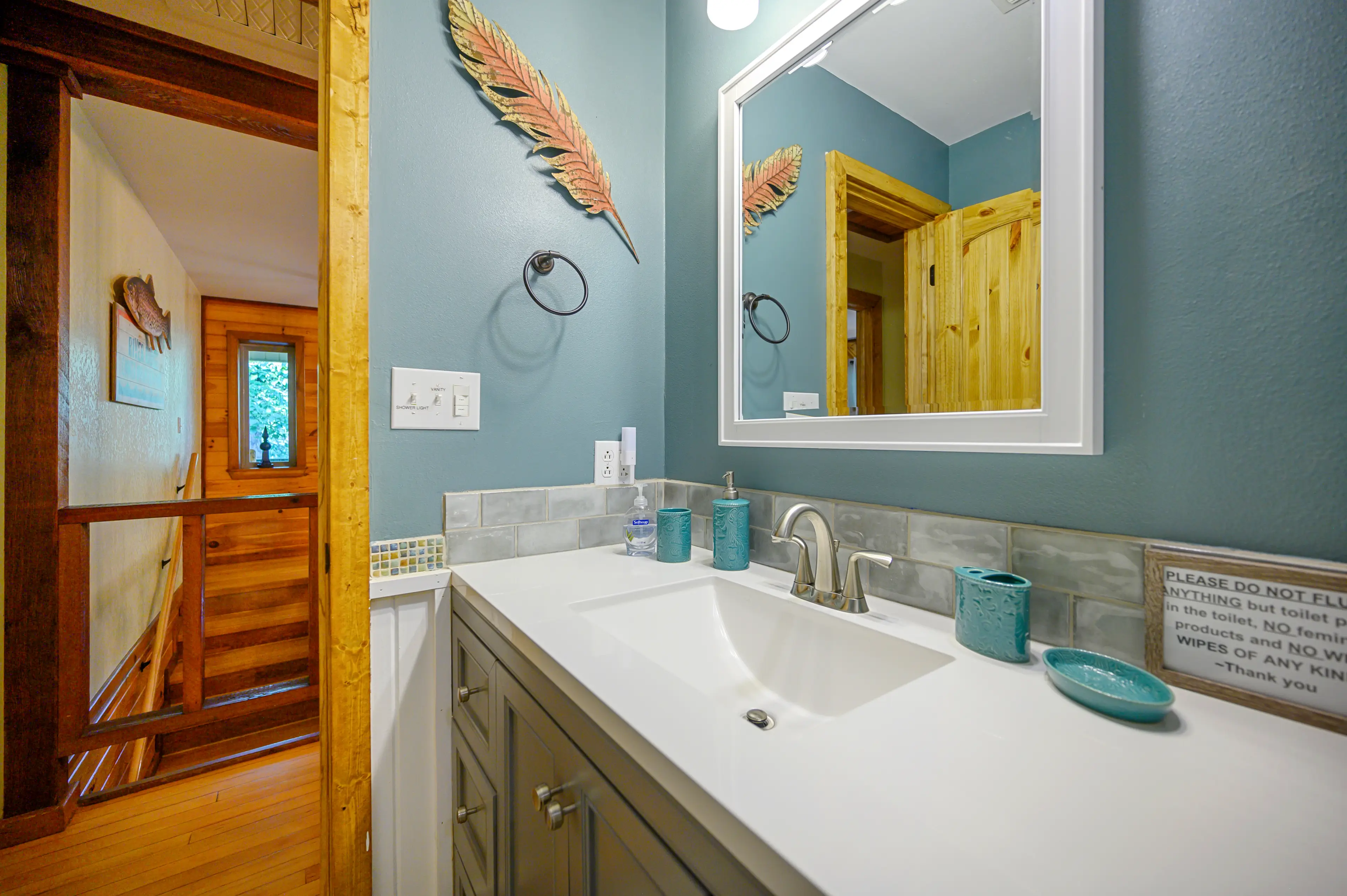 The upstairs bath is shared by the two queen bedrooms.