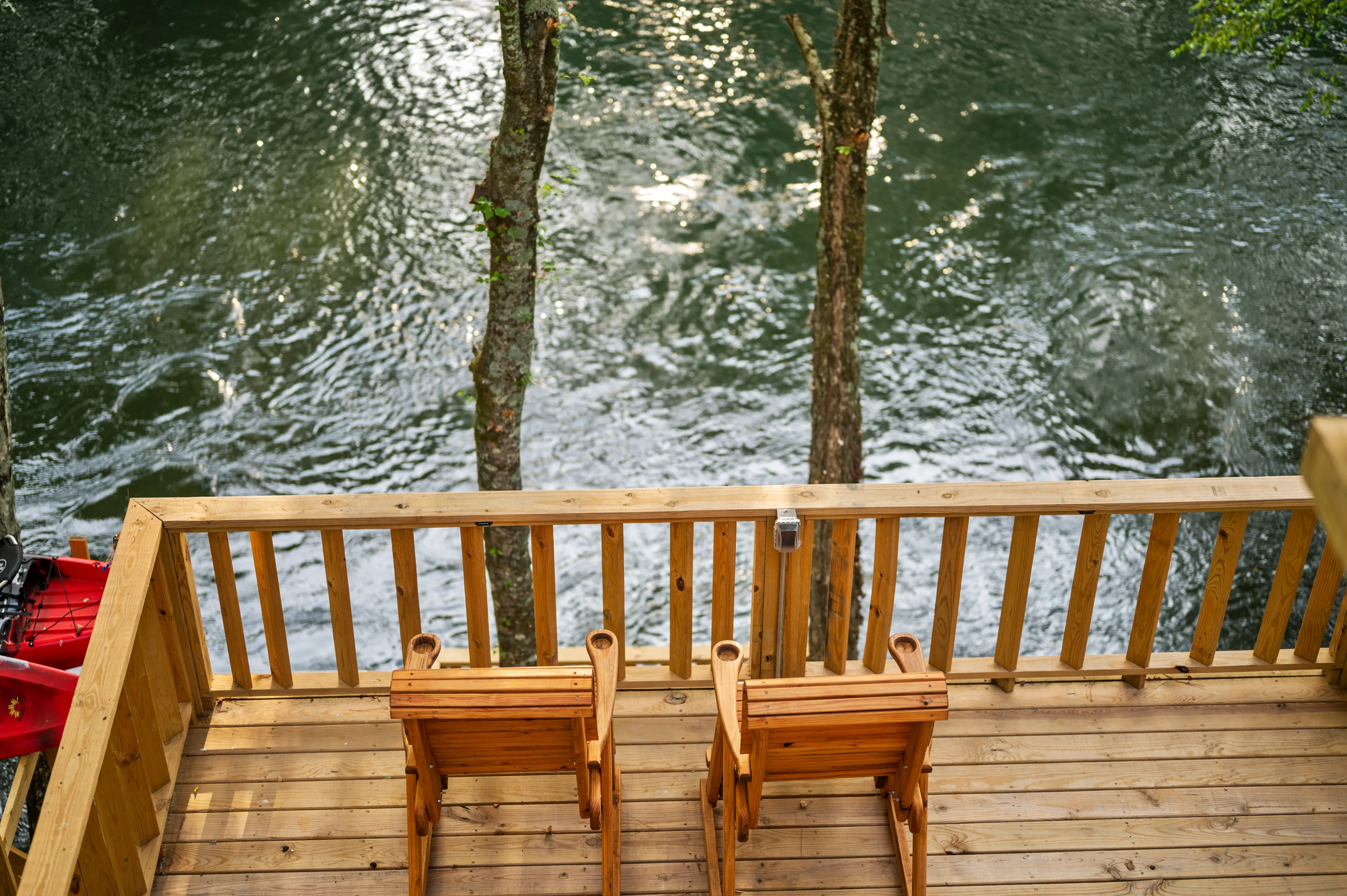 Soak up the views of the lower Mountain Fork from the top level of the deck!