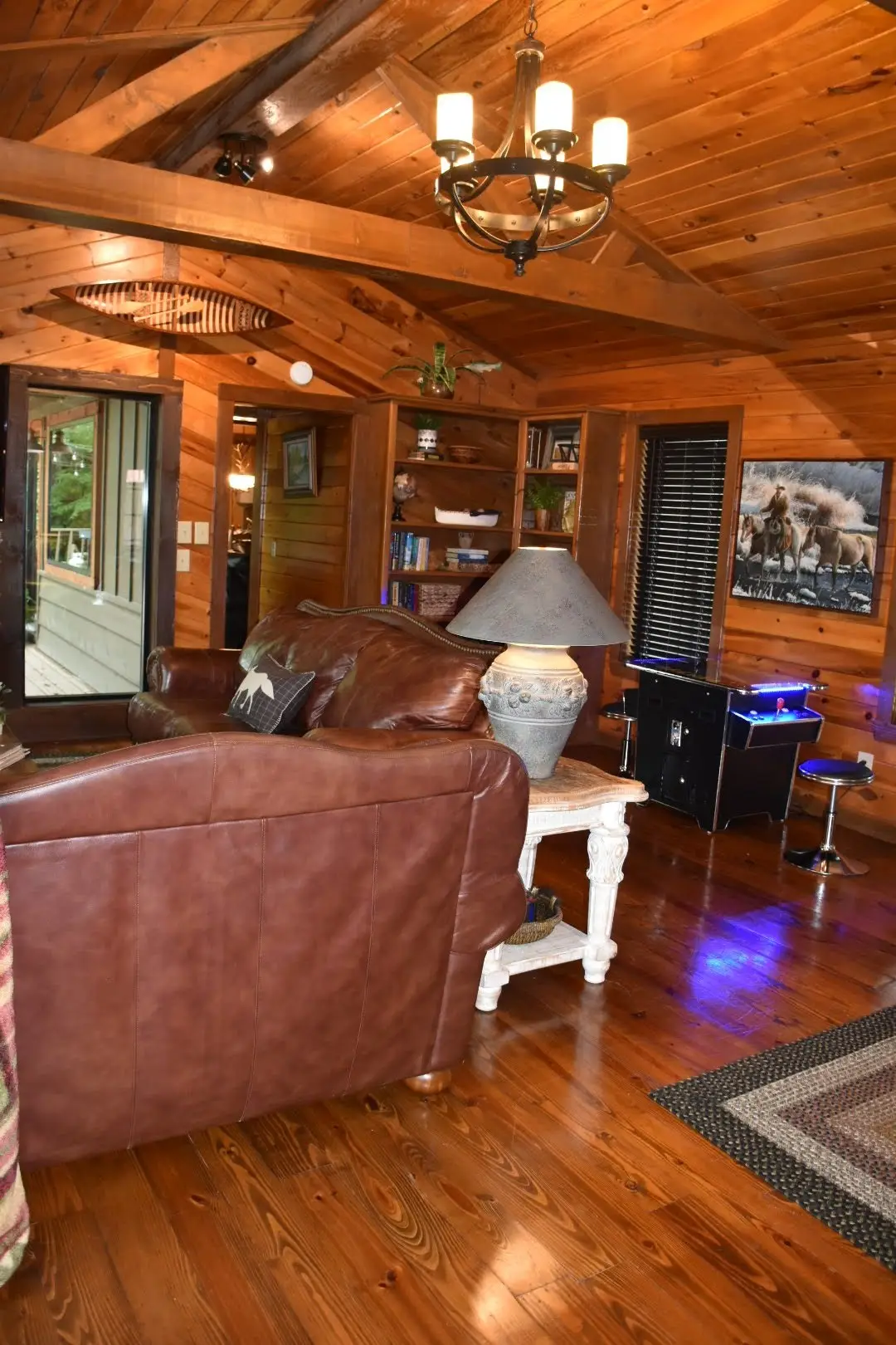 The den connects to the living room with a small hallway