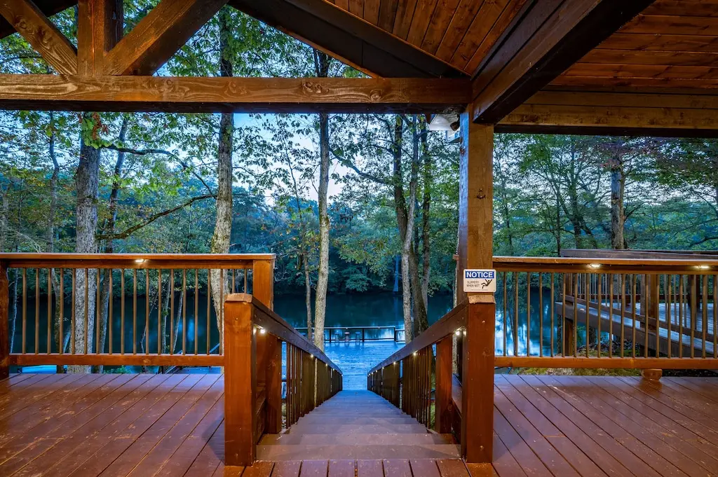 View from the patio with stairs to the lower river level deck.