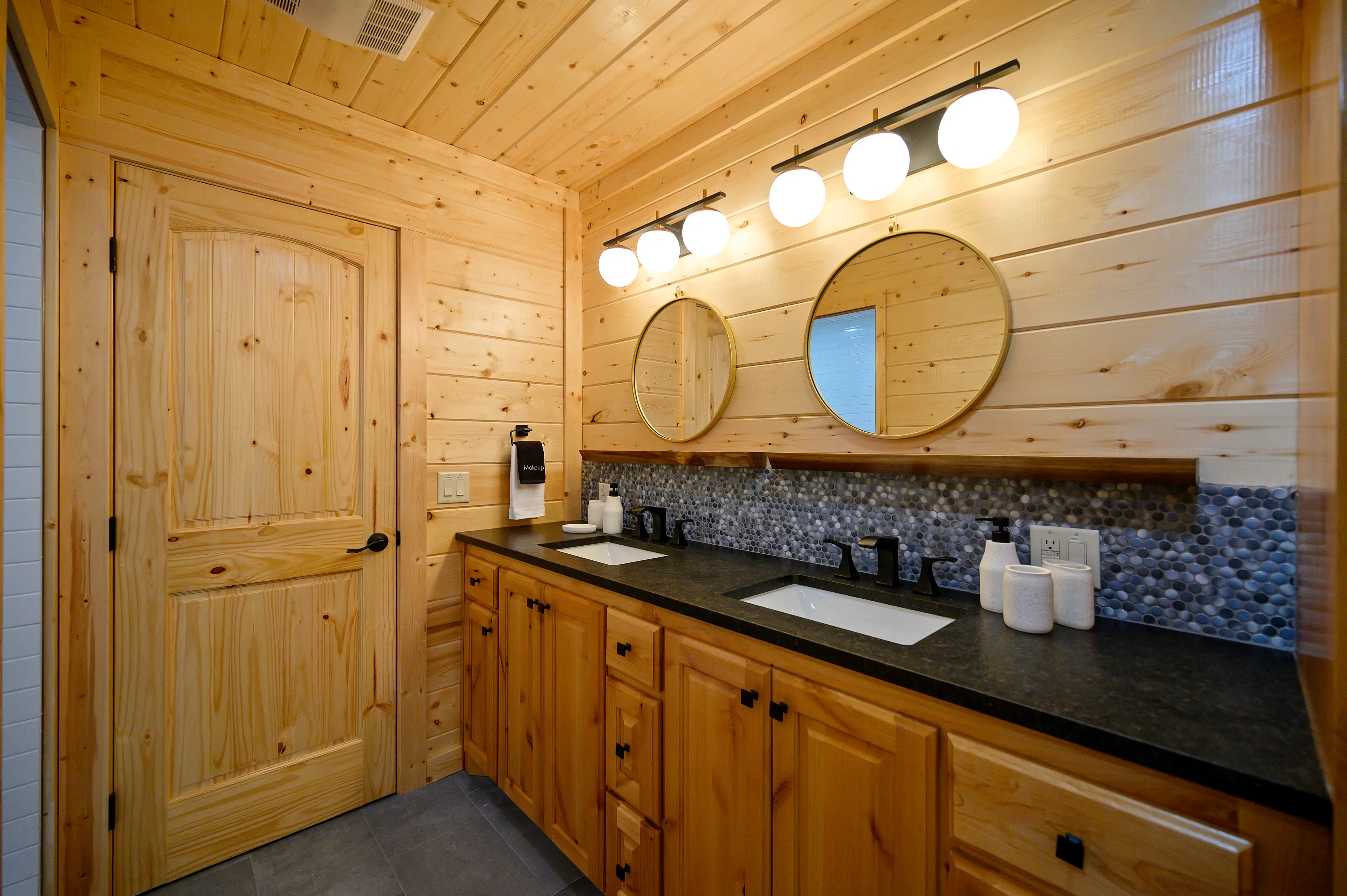 Double vanities and a private toilet closet in the master ensuite bath.
