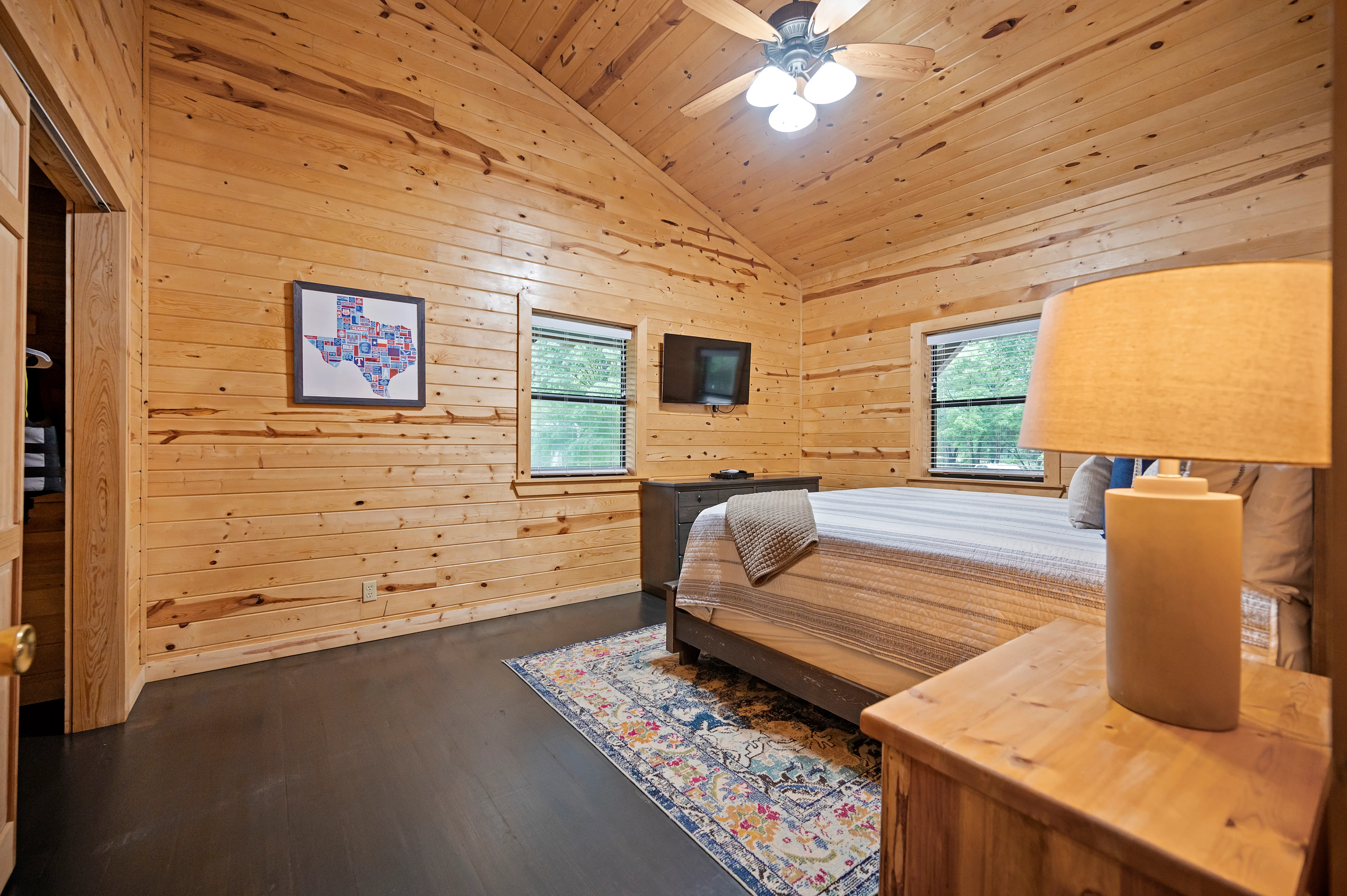 King bedroom #2 with a smart TV and closet space.