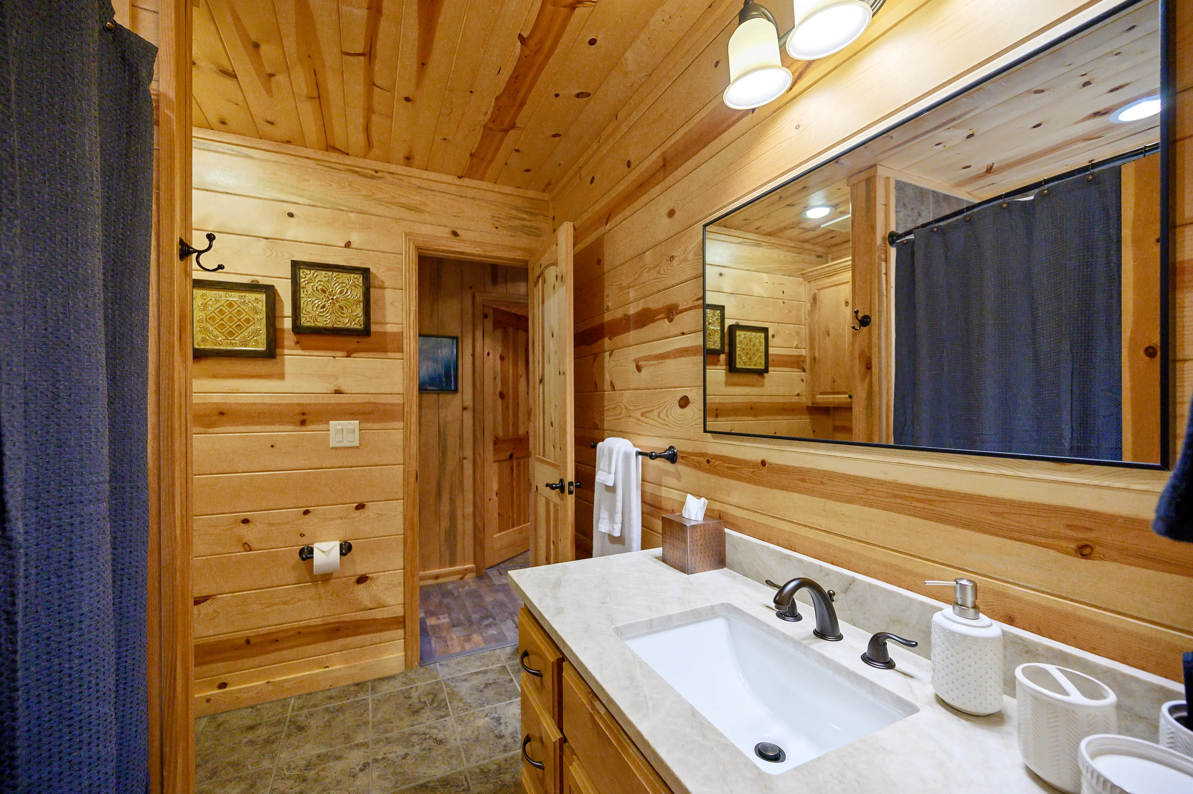 The hall bath keeps the ensuite baths private!