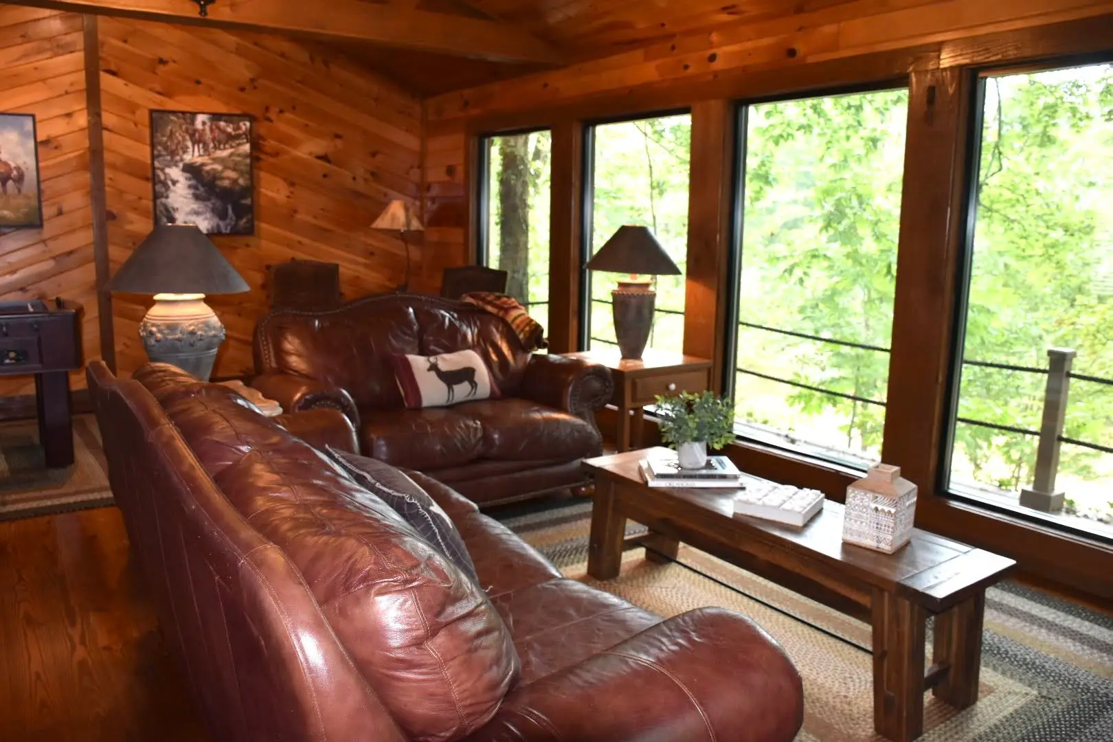 The River Room (or den) has floor to ceiling windows to enjoy the view!