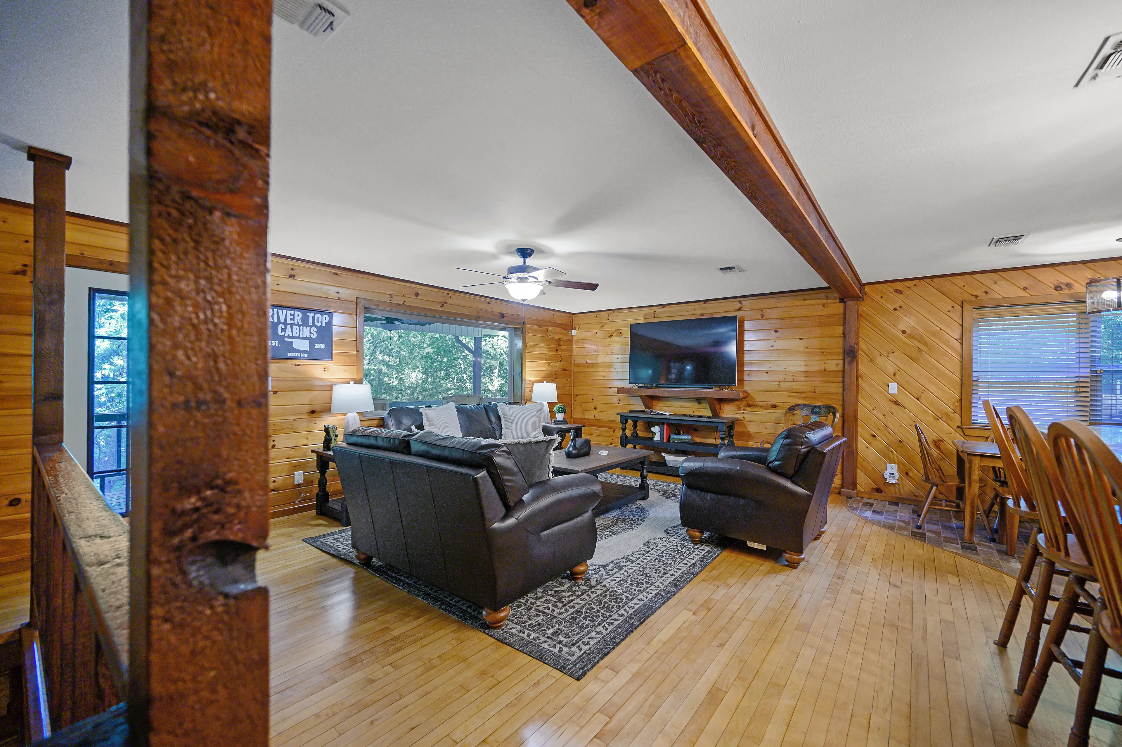 The hallway leads to the upstairs bath and two queen bedrooms.
