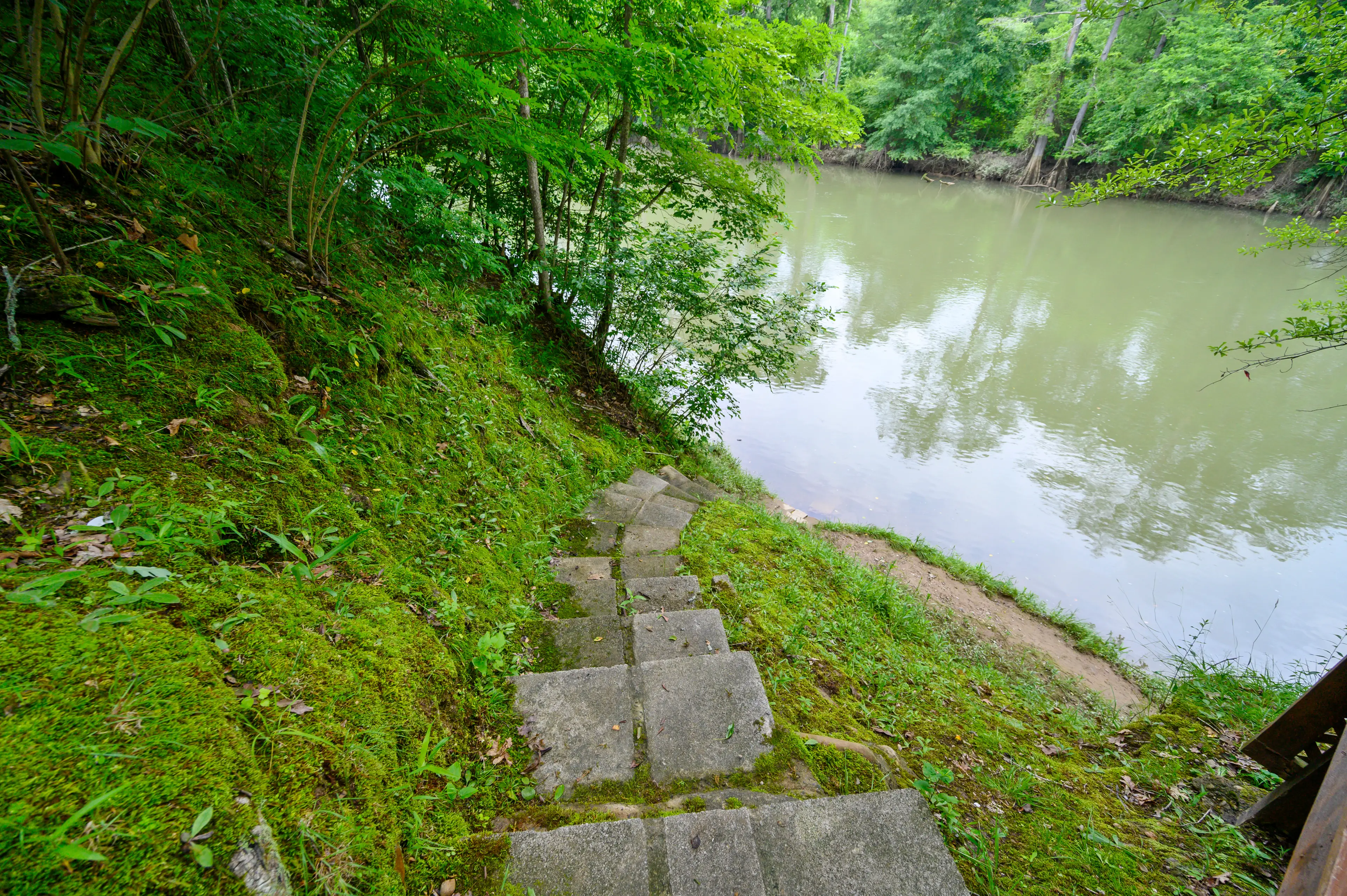 Steps leading to the bank for fishing from the river deck.