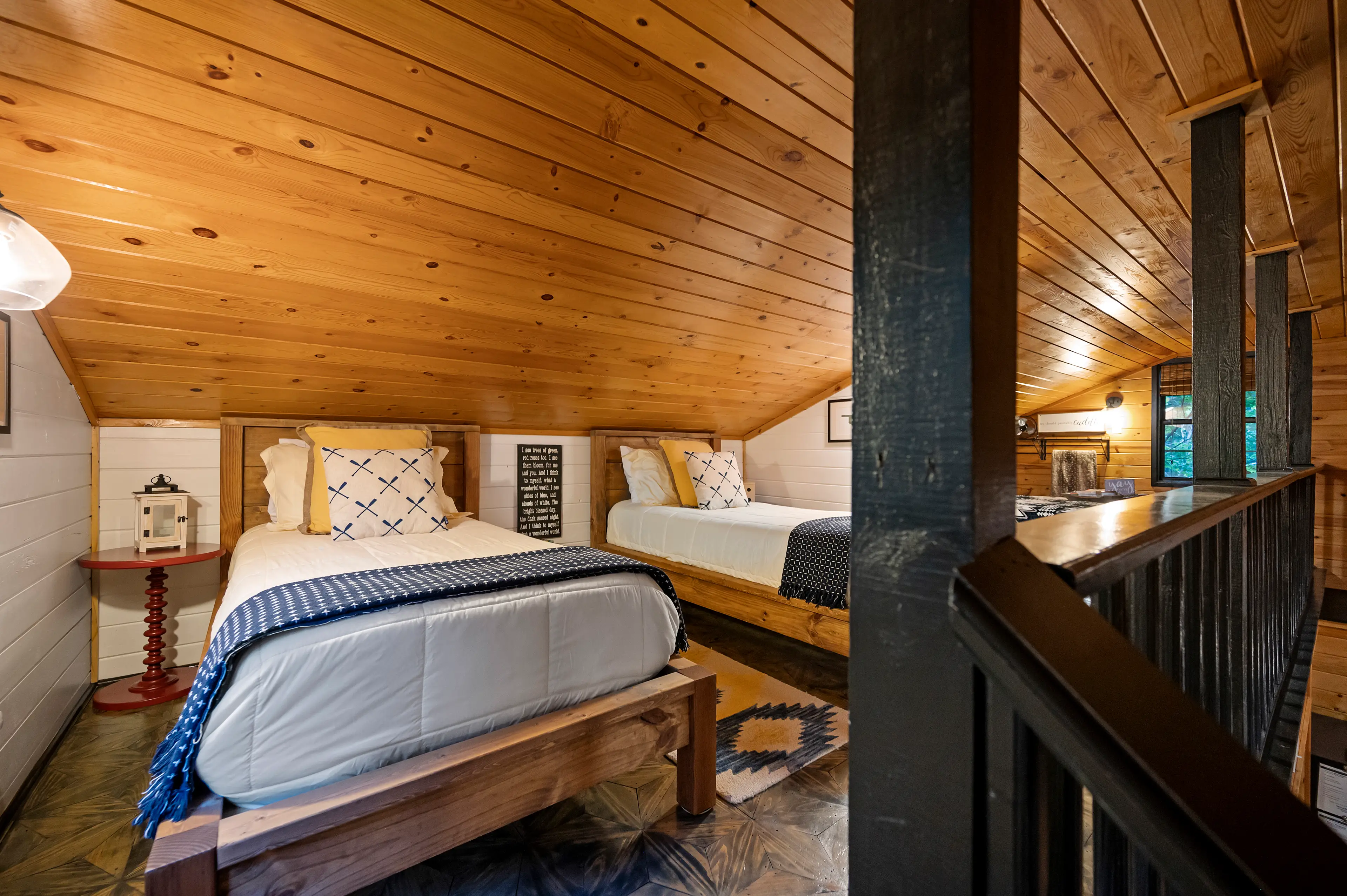The two twin beds when you first land in the loft.