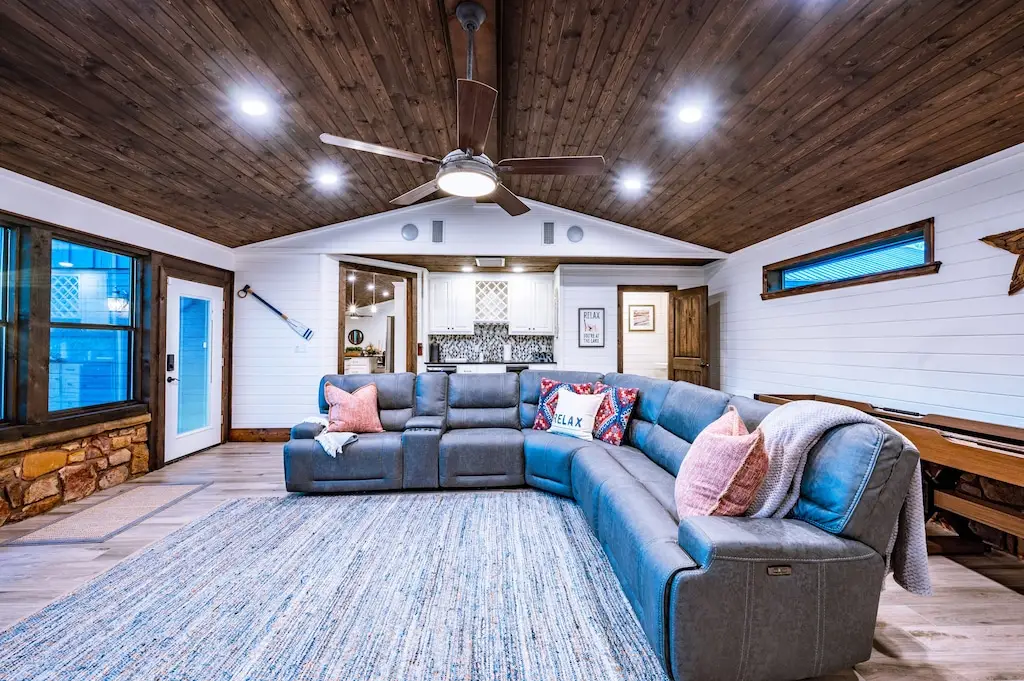 Plenty of seating for watching TV in the game room.