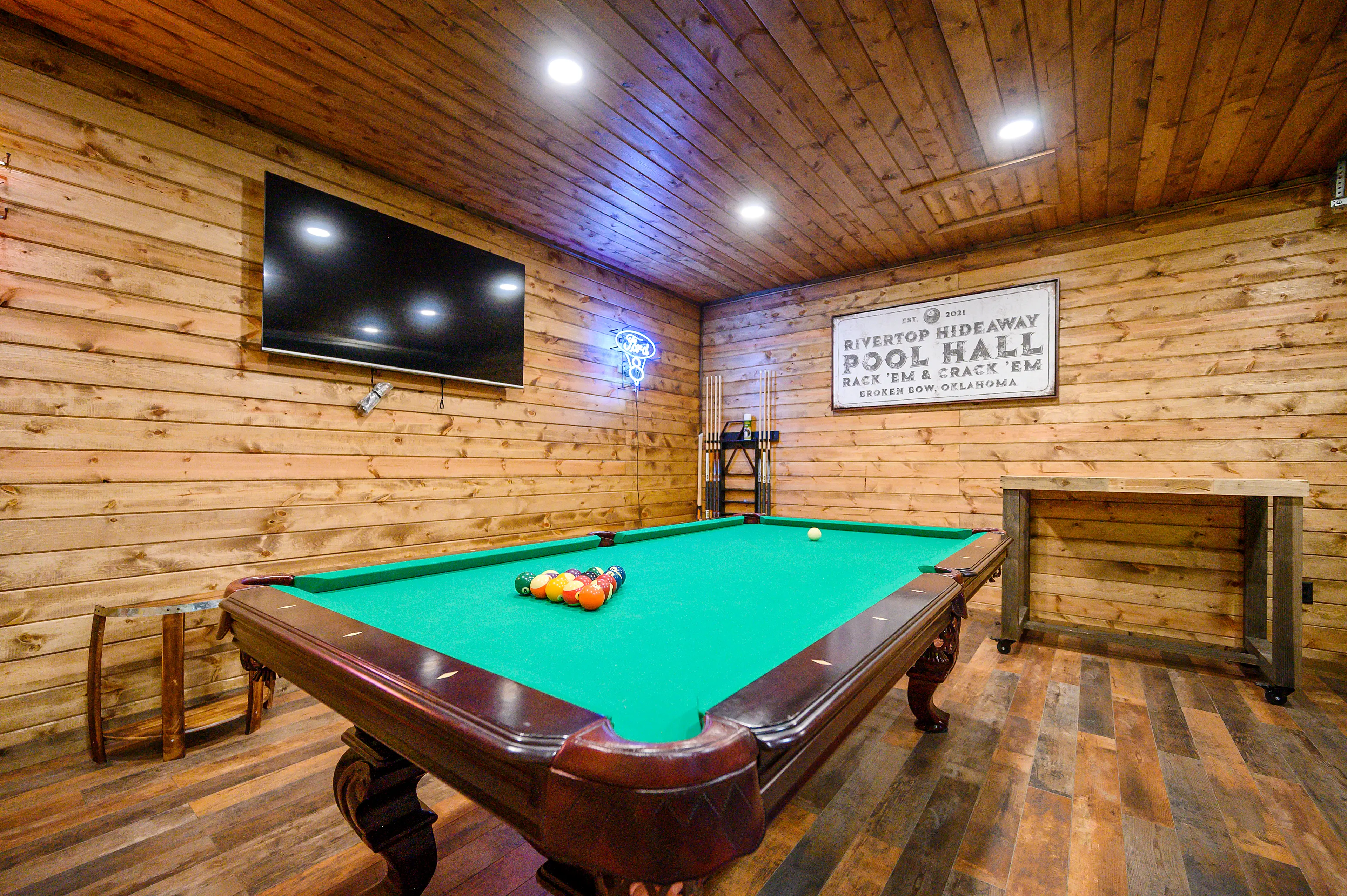 Watch your favorite streaming shows on the large screen TV or challenge each other to a game of pool.